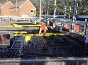 Vision Access Workers Laying Down Decking  